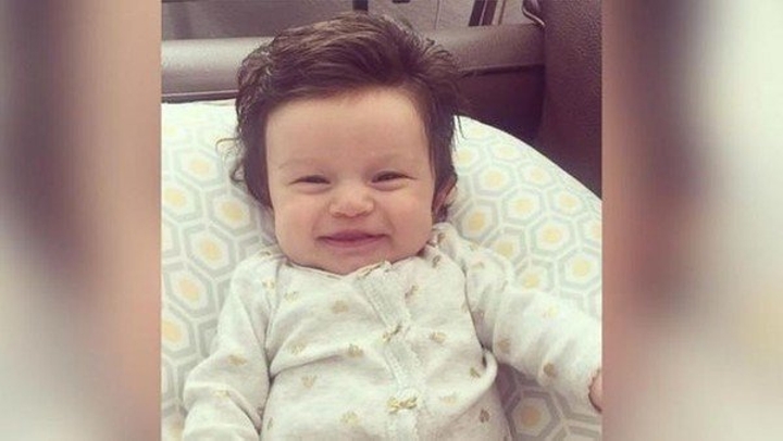 Baby with full set of hair