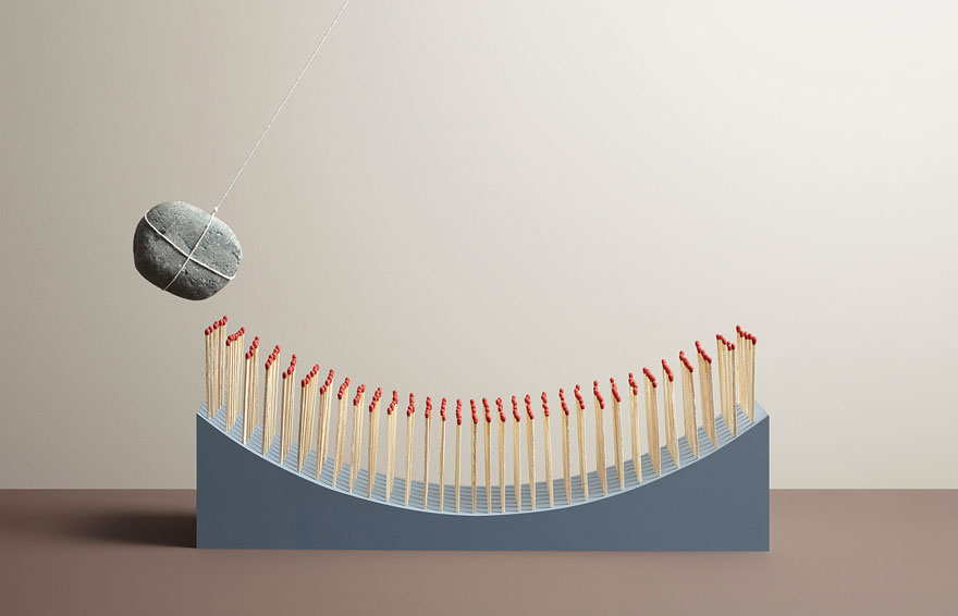 A stone Pendulum over a Bunch Match Stickes | In Anxious Anticipation Aaron Tilley